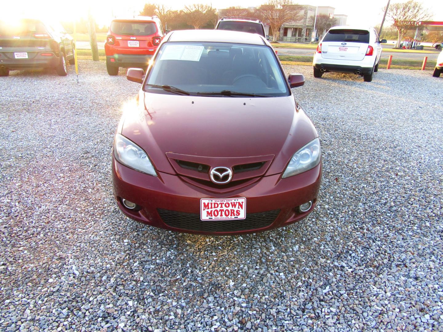 2008 Red Mazda MAZDA3 s Grand Touring 5-Door (JM1BK343481) with an 2.3L L4 DOHC 16V engine, Automatic transmission, located at 15016 S Hwy 231, Midland City, AL, 36350, (334) 983-3001, 31.306210, -85.495277 - Photo#1